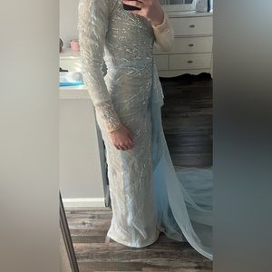 long sleeve mermaid dress with side train